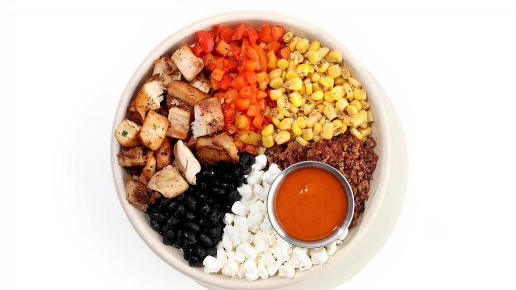 Protein Bowl · roasted chicken, bacon, roasted red peppers, corn, black beans, goat cheese, honey sriracha dressing (GF)