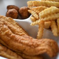 Fish Basket · 2 pieces of fish, fries and hushpuppies.