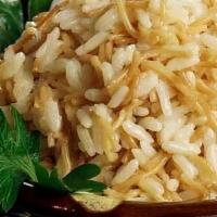 Mediterannean Rice · long grain rice and vermicelli cooked in a vegetable broth. (Vegan)