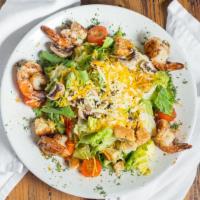 The Breaux Bridge · Grilled shrimp, romaine, mushrooms, bell pepper, cheese, croutons, remoulade, and tomato.