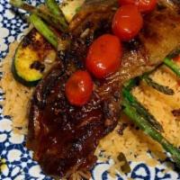 Fiesta Steak · Rib-eye steak with zucchini, asparagus, and cherry tomatoes. Served with rice only.

These m...