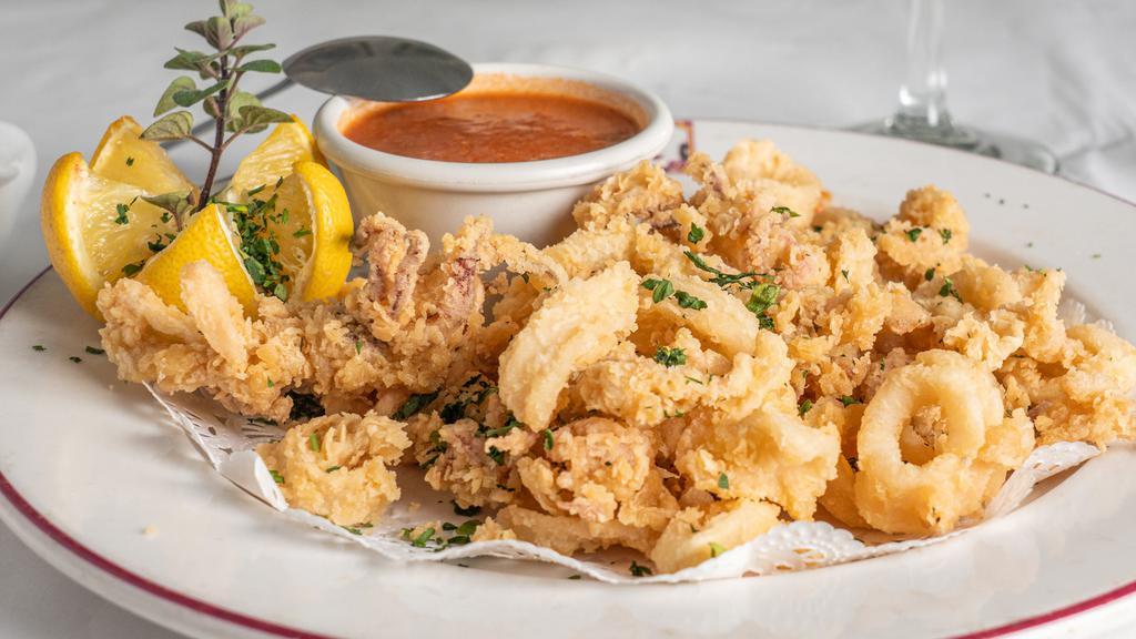 Calamari Fritti · Golden fried calamari served with marinara sauce or sauteed with white wine and herbs.