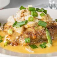 Eggplant Crab Cake Andrea · Louisiana crabmeat, eggplant, and Italian herbs. Topped with lump crabmeat served with lemon...