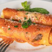 Cannelloni Due Torre Pasta · Pasta stuffed with veal, beef and imported cheeses. Baked and served with a light tomato bas...