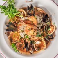 Cioppino Mediterranean · Mussels clams, crabmeat, calamari, and fresh fish cooked in a light tomato broth and fresh h...