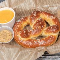 Pretzel · Bavarian soft pretzel served with beer cheese and stone ground mustard.