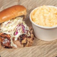 Pulled Pork Sandwich · 1/3 lb pulled pork shoulder on a Kaiser bun with Chumpy's BBQ Sauce and topped with Coleslaw...