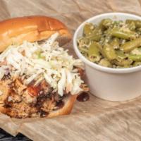 Pulled Chicken Sandwich · 1/3 lb pulled chicken served on a Kaiser bun with Chumpy's BBQ Sauce and topped with Colesla...