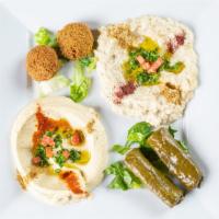 Veggie Delight · Hummus, baba ganoush, grape leaves, falafel.