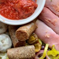 Hot Antipasto · Italian meats, cheeses, sausage, meatballs, stuffed mushrooms, olives, green peppers, cherry...