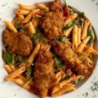 Crispy Chicken Rustico · Fried chicken breast sautéed with ziti pasta, mixed in fresh spinach and roasted red peppers...