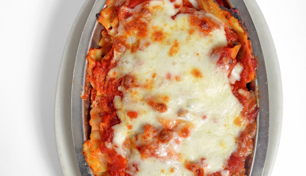 Amedeo’S Famous Lasagna · Layers of lasagna noodles baked with ricotta, parmesan, ground beef, sausage, homemade marinara, topped with mozzarella cheese and baked to perfection.