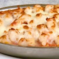 Seafood Lasagna · Layers of lasagna noodles baked with ricotta, parmesan, fresh crab, scallops, shrimp, homema...