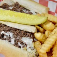 Johny D'S Philly Steak Sub · Slices of Philly steak cooked with grilled onions, mushrooms and peppers topped with melted ...