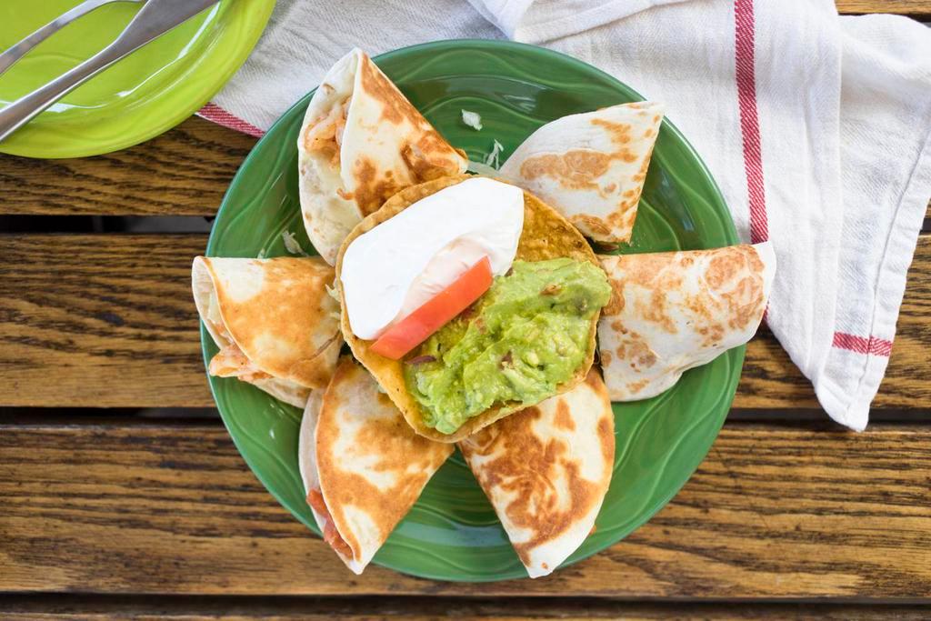 Shrimp Quesadilla · Quesadilla con camarones. Our fantastic quesadilla filled with bay shrimp and cheese. Topped with lettuce, guacamole, sour cream and tomatoes.