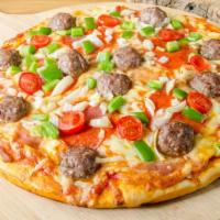 Meatball Pizza (Gluten Free) · Meatballs and oregano with parmesan and mozzarella cheese on a fresh baked pizza.