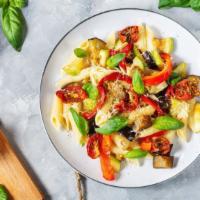Veggie Primavera · Sautéed mushrooms, onions, green peppers, tomatoes, and black olives over penne pasta and to...