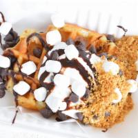 S'More · Toasted belgian waffle with marshmallow fluff, hershey's chocolate chips, graham cracker cru...
