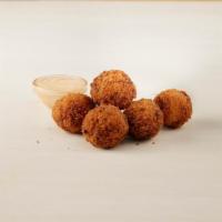 Cheesy Chicken Poppers · Crispy & Spicy House Made Cheesy Chicken Poppers with One Dipping Sauce. Mississippi Comebac...