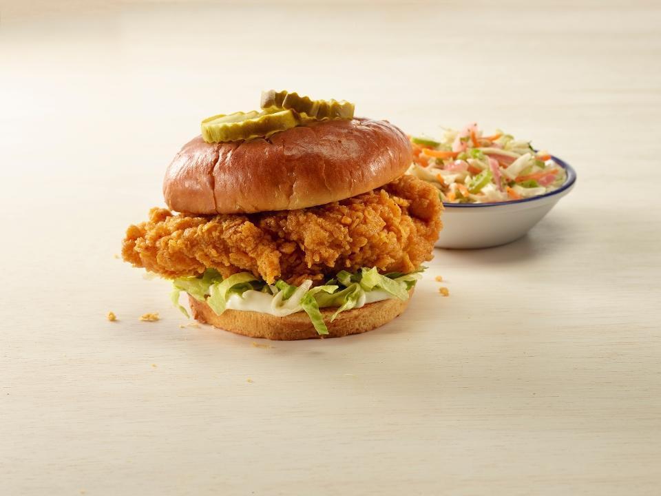 Sandwich Classic Fried · Crispy Fried Chicken Sandwich with Mayo, Shredded Iceberg Lettuce, & Dill Pickles on a Potato Bun. Served with one side.