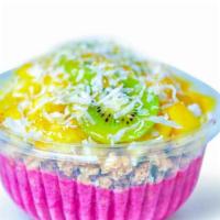 Pink Rainbow Pitaya Bowl · Our tasty homemade Pitaya base topped with granola, pineapple, mango, kiwi, coconut flakes, ...