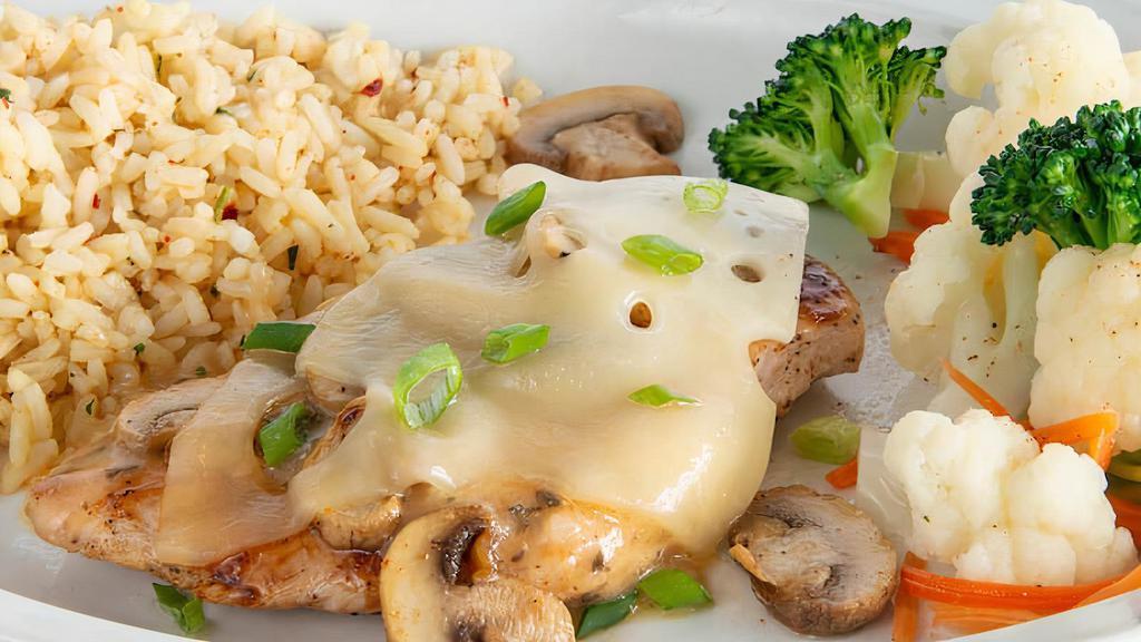 Mushroom Swiss Chicken · Grilled chicken breast brushed with garlic Parmesan sauce, then topped with sautéed mushrooms and melted Swiss cheese. Garnished with green onions. Served with a choice of 2 sides.