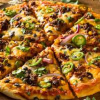 Mexican Pizza · Delicious pizza with beef, jalapeño, tomatoes, onions and cheddar.