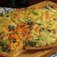 Super Veggie Pizza · Delicious pizza with spinach, artichoke, fresh garlic, green peppers, tomatoes, broccoli, mu...