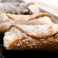 Cannoli · Italian pastry filled with sweetened ricotta cheese and chocolate bits.