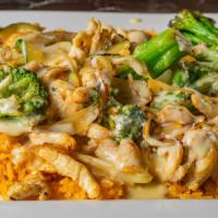 Arroz Con · Your choice of grilled meat sautéed with onions, broccoli and zucchini. Served on a bed of r...
