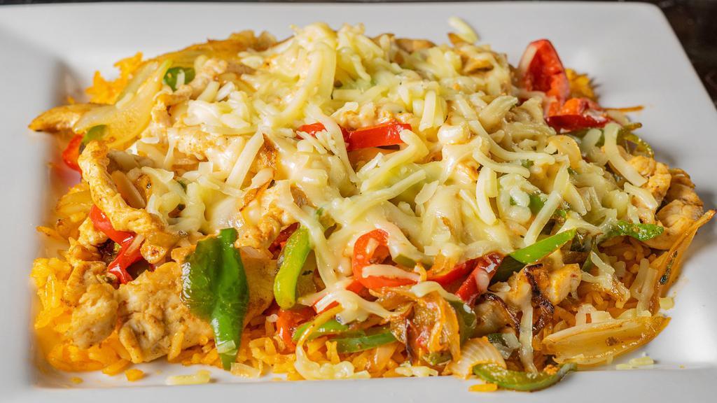 Peluza · Your choice of grilled meat sautéed with. onions and bell peppers. Served on a bed of. rice topped with melted cheese.