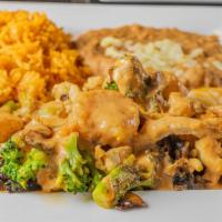 Chef'S Special · Grilled chicken and shrimp simmered and smothered. with broccoli, mushrooms and our creamy t...
