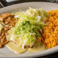 Burrito Mexicano · A flour tortilla filled with your choice of shredded. chicken, beef or pork. Topped with che...