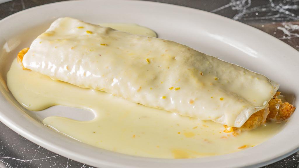 Chico California Burrito · A burrito filled with your choice of meat as well as. refried beans, rice. Topped with cheese sauce, fresh. pico de gallo and guacamole.