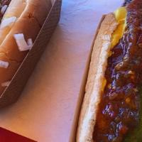 Hot Dogs · A hot dog with chilli,onions,mustard,and ketchup.