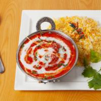 Signature Murg Makhani · Boneless tandoori chicken cooked in a rich and creamy sauce with fresh tomato and a combinat...