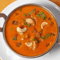 Korma Kashmiri · Chicken cooked in a creamy sauce with cashews and raisins, lightly spiced. Substitute with l...