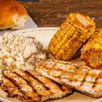 Grilled Chicken · Two seasoned chicken breasts chargrilled to perfection served with choice of two sides. Caju...