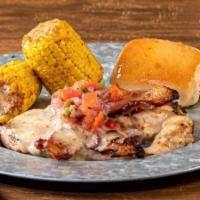 Southwestern Chicken · Two grilled chicken breasts topped with crispy bacon, Swiss cheese, and housemade pico de ga...