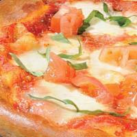 Piccola Margherita · Pizza sauce fresh mozzarella tomatoes basil.
