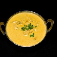 Chicken Cashmere · Chunks of chicken cooked in mild cream sauce with cashew nuts and golden raisins.