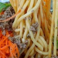 Spicy Beef Noodles · Egg noodles, ground beef, ground chilis, and shredded veggies (carrots and cucumbers)