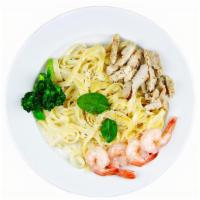 Fettuccine Alfredo · Fettuccine pasta smothered in creamy Alfredo sauce and topped with Parmesan Cheese. Choice o...