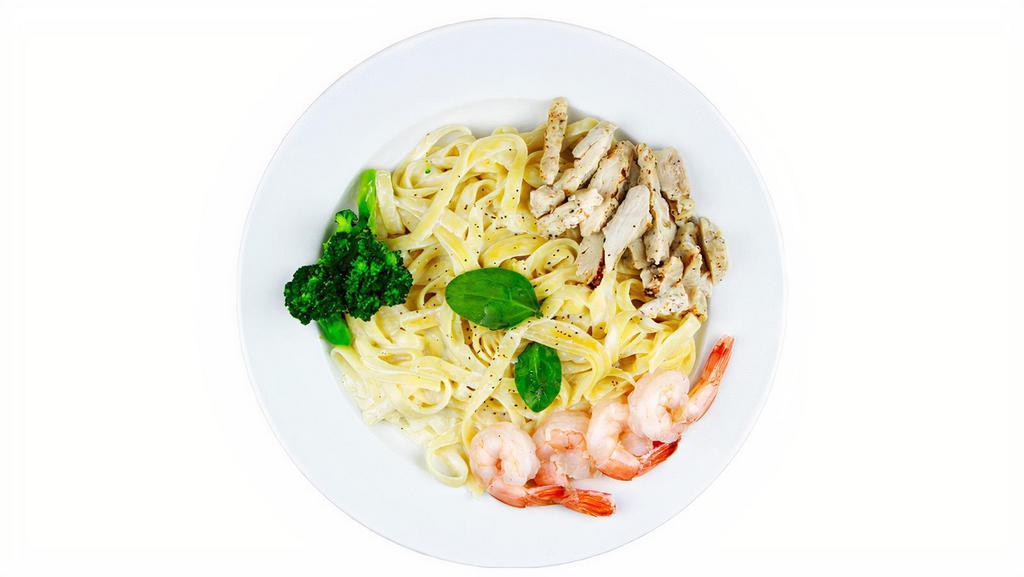 Fettuccine Alfredo · Fettuccine pasta smothered in creamy Alfredo sauce and topped with Parmesan Cheese. Choice of: Chicken, Shrimp, Cajun Chicken & Broccoli.