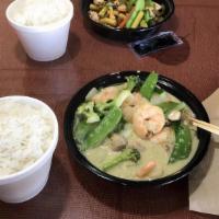 Green Curry · Spicy. Choice of chicken, beef or shrimp simmered in a traditional green coconut curry sauce...