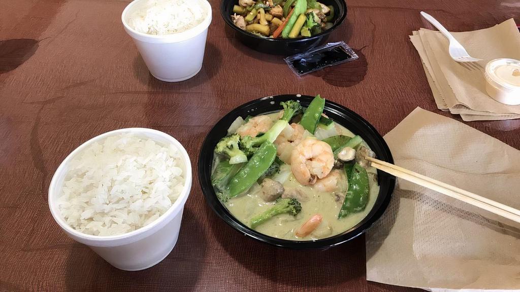 Green Curry · Spicy. Choice of chicken, beef or shrimp simmered in a traditional green coconut curry sauce with simmered fresh vegetables.
