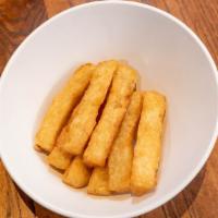 Yuca Fries · Regular order is 8 large is 12.