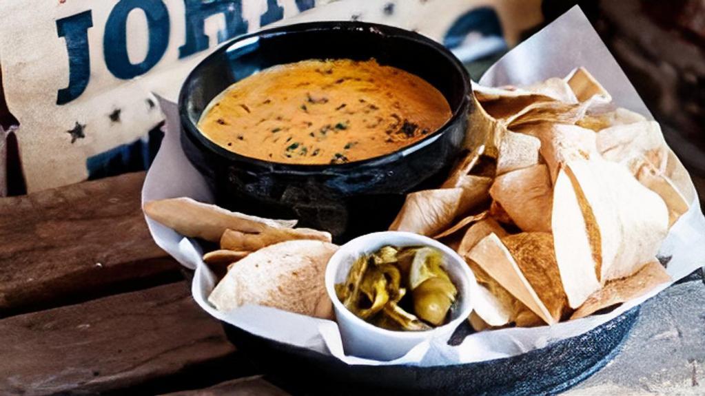 Queso Dip
 · Served with tortilla chips.