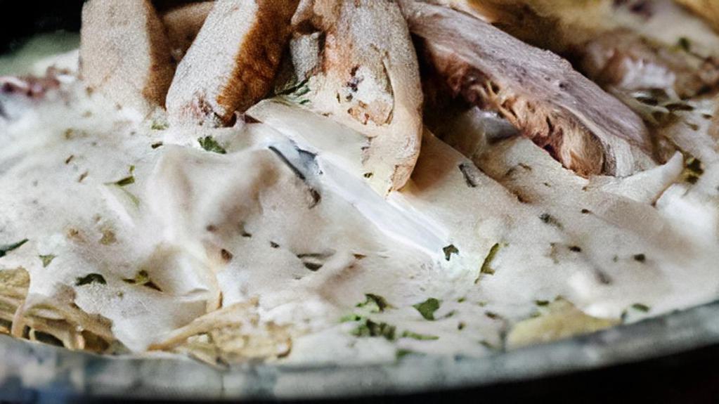 Chicken Alfredo · Angel hair pasta served with our creamy alfredo sauce and grilled chicken.