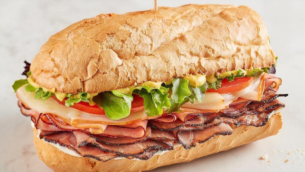 Memphian®  · Smoked turkey, Black Forest ham and Black Angus roast beef, provolone, spring mix, tomato, mayo and spicy brown mustard on baguette